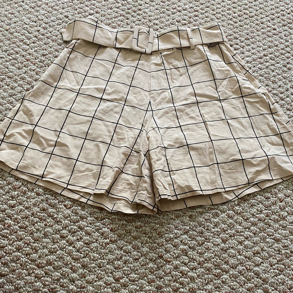 Checkered shorts.